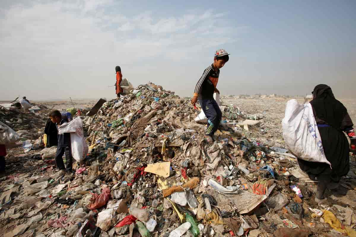 Søppelsamlere utenfor Baghdad, Irak, August 2016