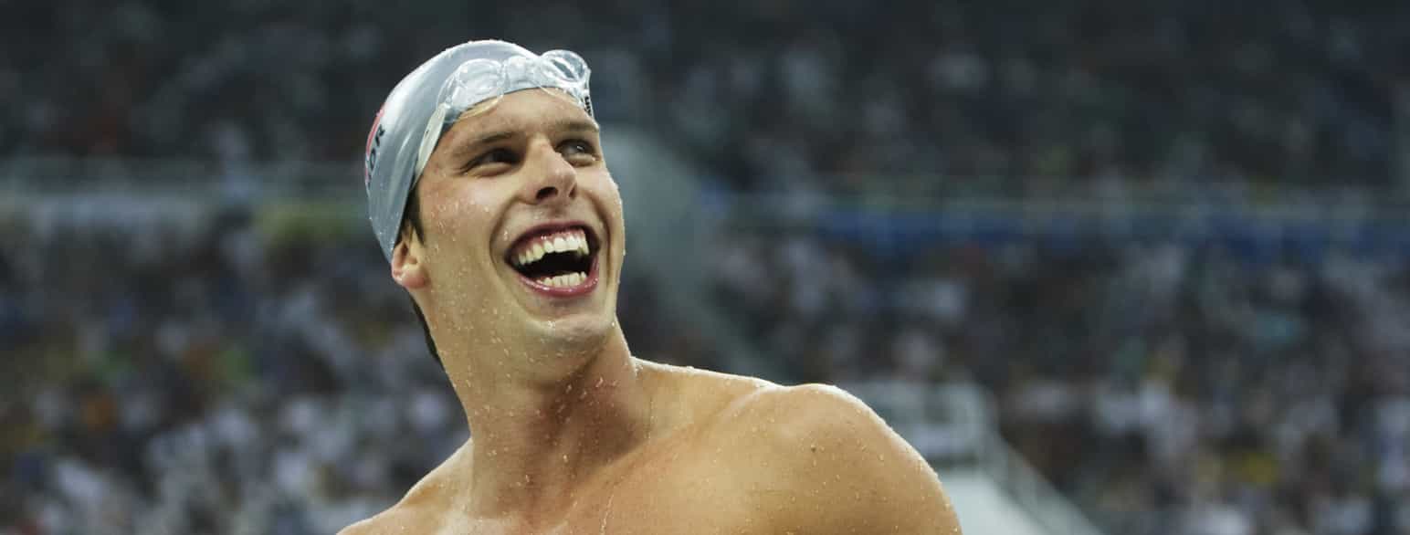 Alexander Dale Oen smiler etter å ha satt ny olympisk rekord på 100m bryst i semifinalen under OL i Beijing i 2008, der han tok sølvmedalje.