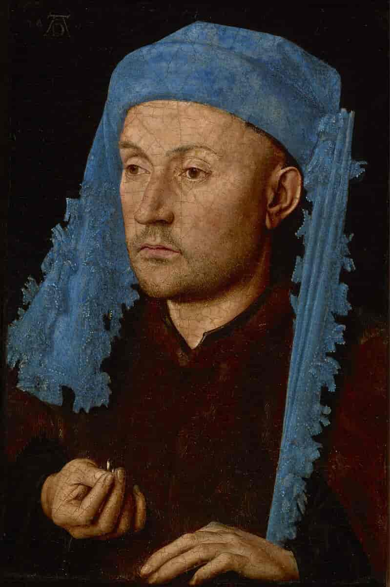 Portrett av en mann med et blått hodeplagg