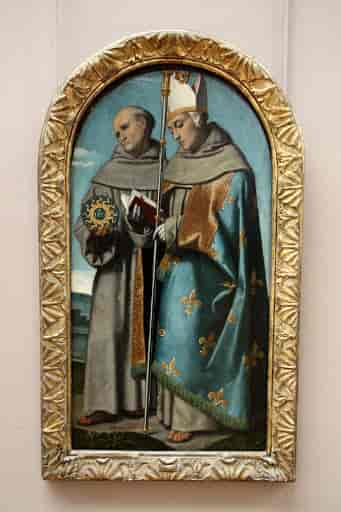 Maleri som forestiller St. Bernhardin av Siena til venstre og St. Louis av Toulouse. Bernhardin holder sitt karakteristiske Kristus-monogram i hånden. Bildet er malt av Alessandro Boncivino, som døde i 1554. Bildet henger nå i Louvre i Paris.
