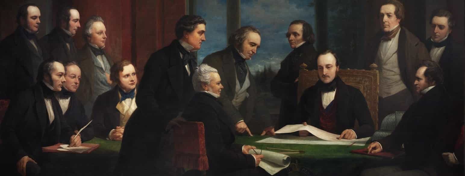 «De kongelige kommissærene for verdensutstillingen i 1851», prins Albert sittende ved skrivebordet til høyre i bildet med et papir i hånden