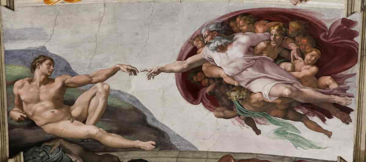 Adams skapelse fra Michelangelos tak i Det sixtinske kapellet