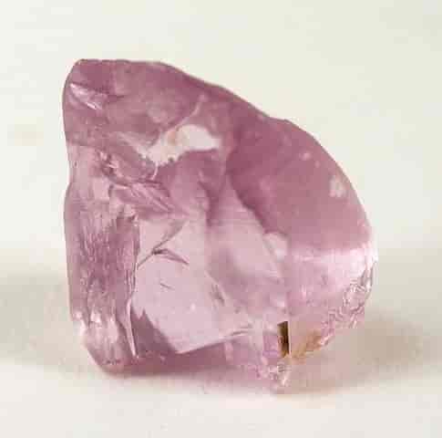 A rare, gemmy and lustrous, vivid lavender kunzite crystal from Jos, Nigeria