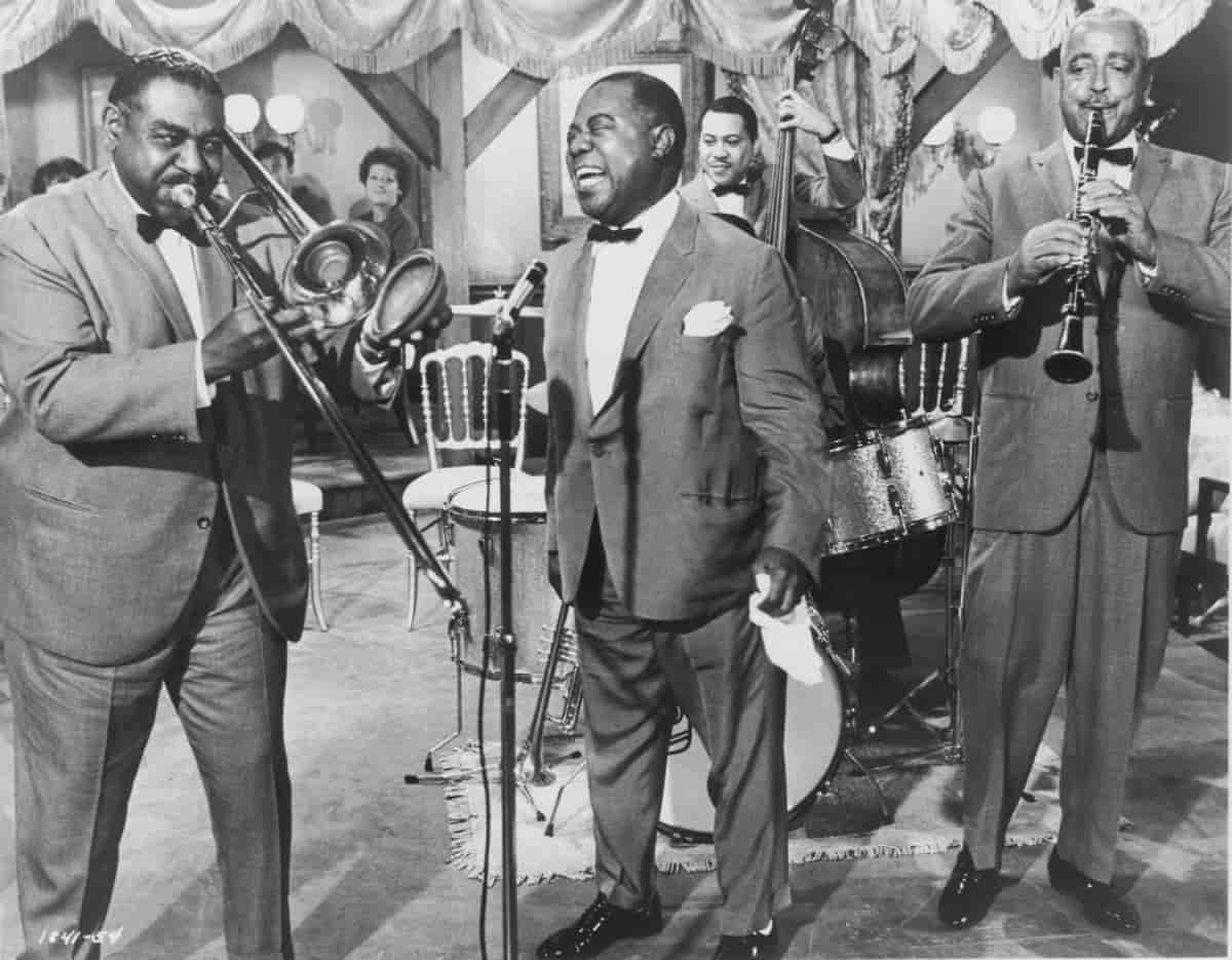 Louis Armstrong med musikarar, ca. 1960