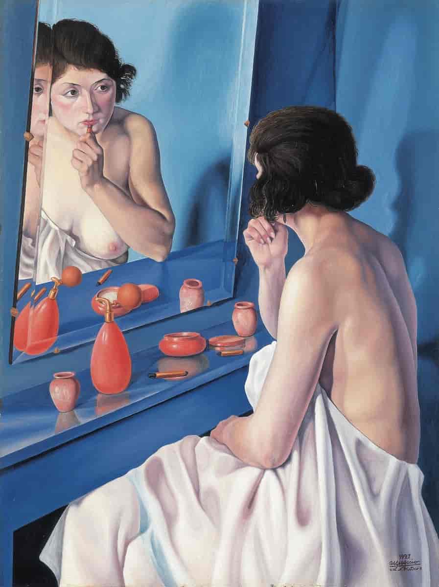 kvinne foran speilet