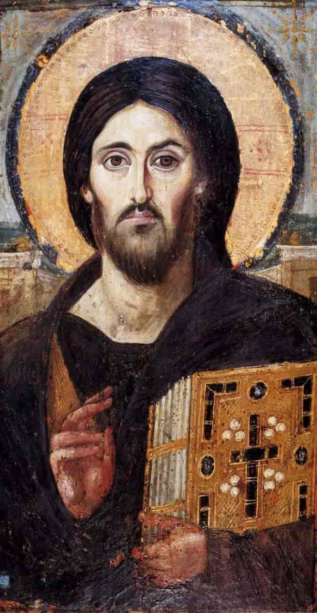 Et gammelt maleri av Jesus. Han har skjegg og holder en bok i den ene hånden. Den andre hånden løfter han mot den som ser på. Det er en glorie rundt hodet hans.