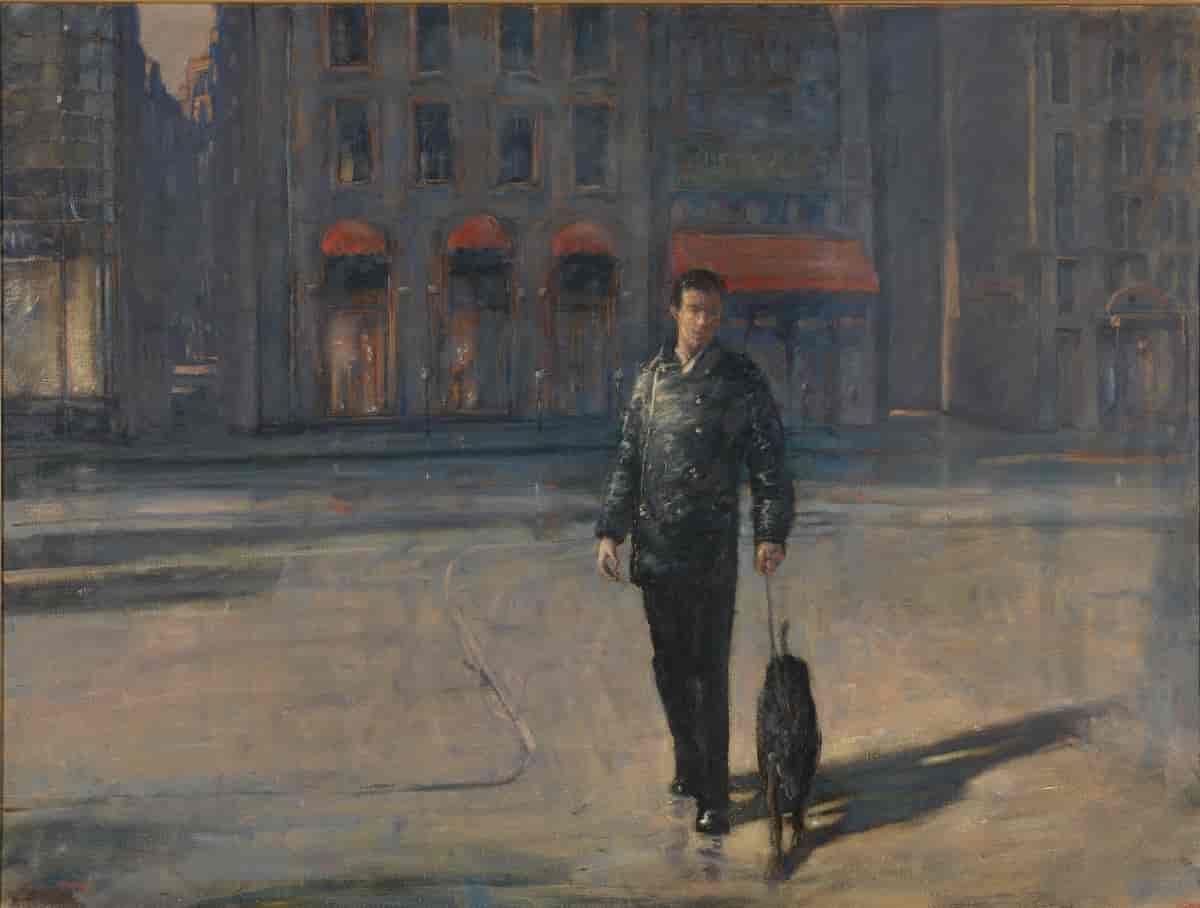Mann og hund i gatene