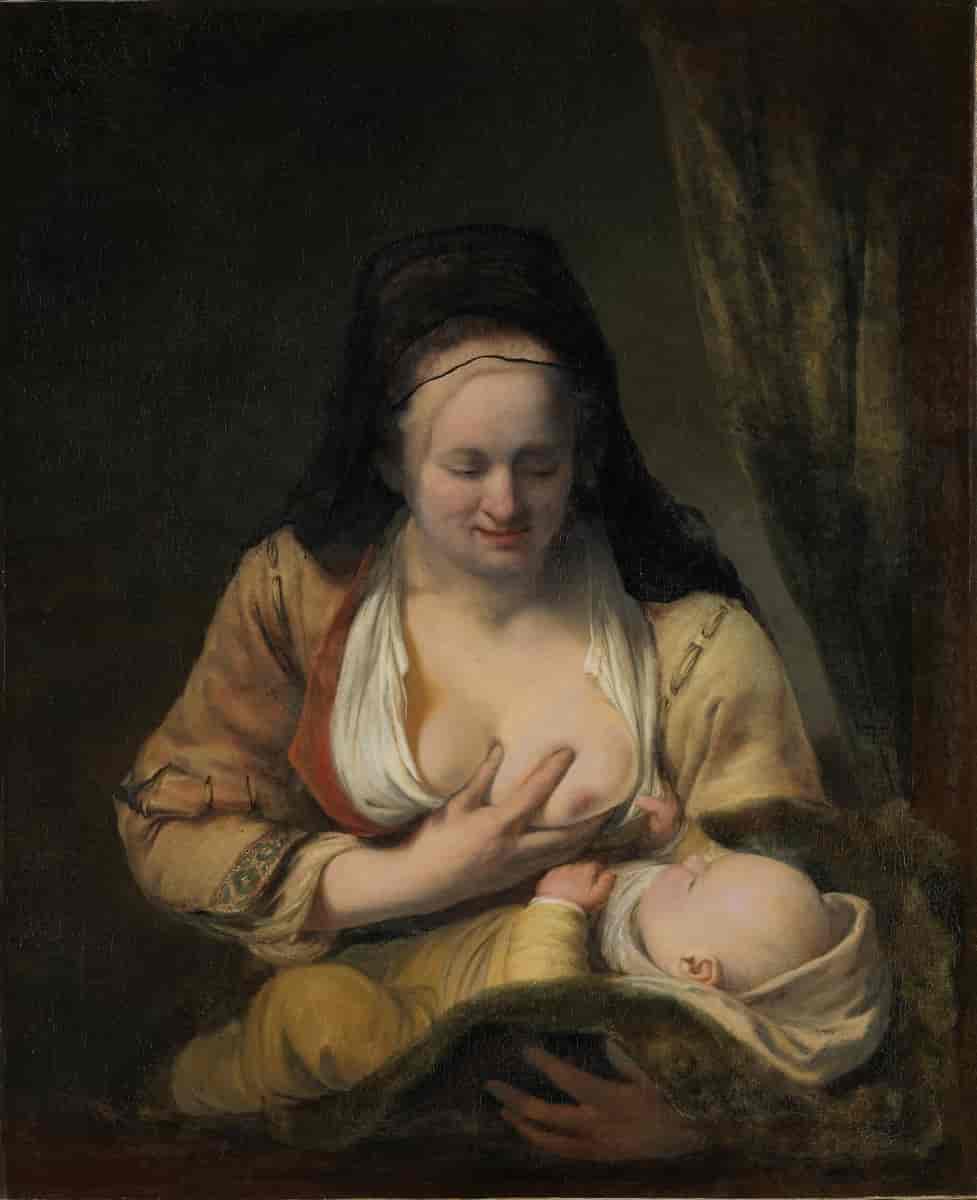 Kvinne med barn ved brystet
