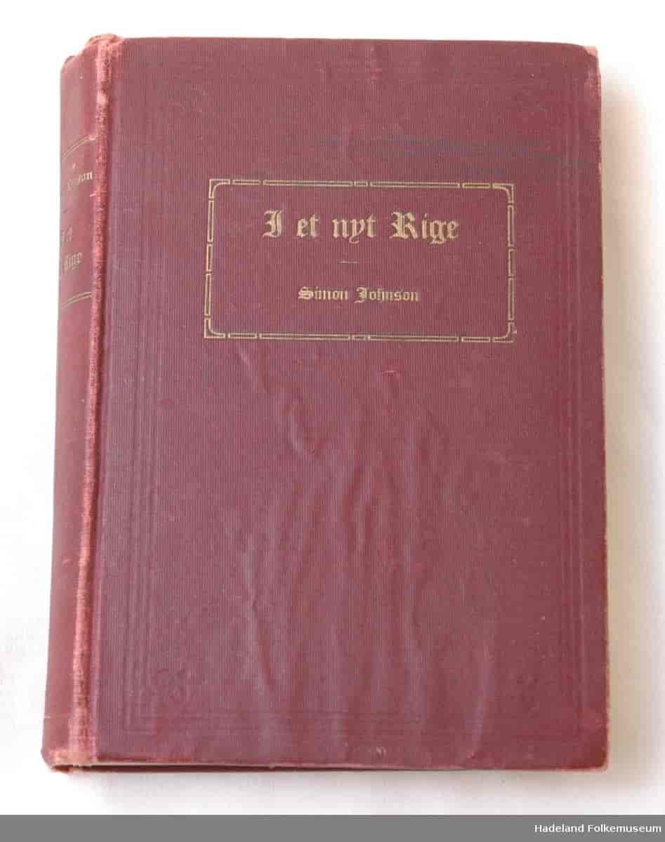 Foto av bok med preget sjirtinginnbinding (utgitt 1914)
