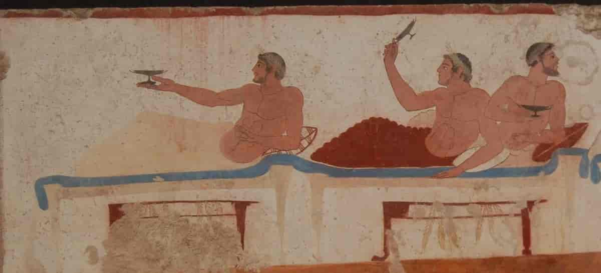Greske bordfeller spiller kottabos med vinbeger (Veggmaleri fra Museet i Paestum)